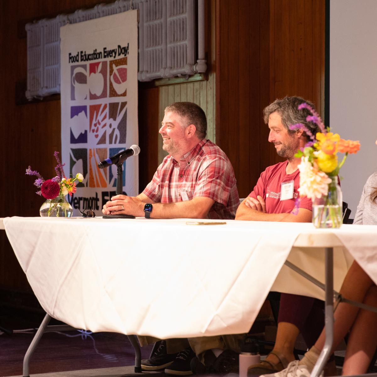 Scott Fay speaks on a cafeteria panel during the 2022 Northeast Farm to School Institute Retreat at Shelburne Farms.