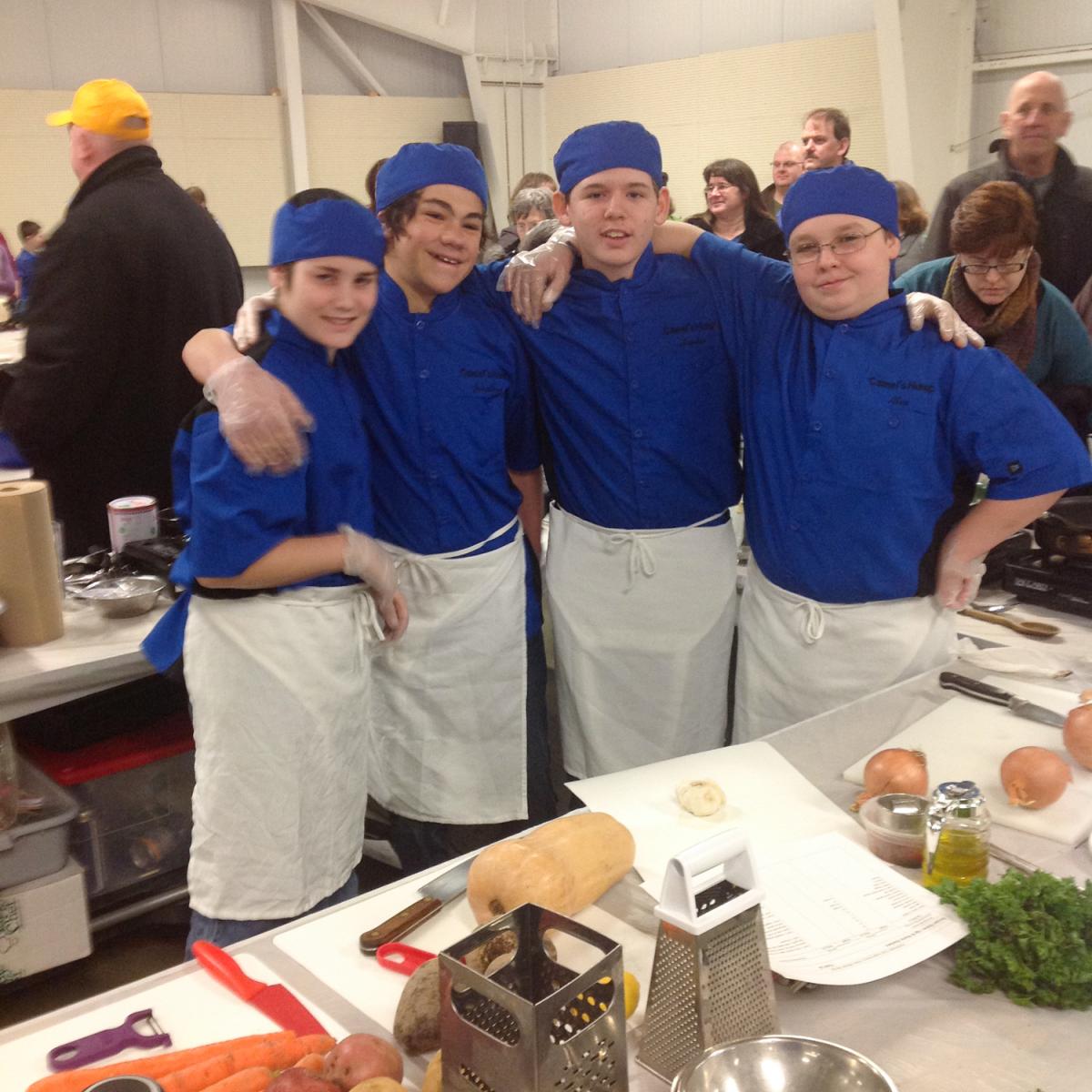 Four boys of the Camels Hump Middle School during the Jr Iron Chef VT competition